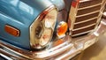 Detail of classic car. Close-up of headlight of the museum of vintage cars Royalty Free Stock Photo