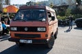 Detail of a classic orange Volkswagen T3 Syncro off-road 4x4 van