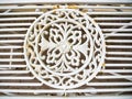 Detail of classic vintage ornament as decoration in cast iron white chair