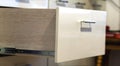 A detail close up shot of a laminate stylish kitchen drawer Royalty Free Stock Photo