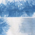 Detail close up shot of tie dye blule shirt. Showing the texture of fabric