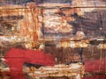 Detail and closeup of old and colored boat wooden hull, old painting with cracks and wood texture Royalty Free Stock Photo