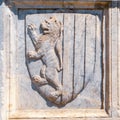 detail of coats of arms in stone