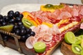 Detail of a cold cuts board on the table. Royalty Free Stock Photo