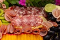 Detail of a cold cuts board on the table. Royalty Free Stock Photo