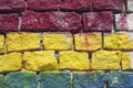 Detail of colored brickwall in red, yellow and blue Royalty Free Stock Photo