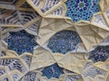 Colored decorated ceiling to forms of stars of a madrasah in Uzbekistan.