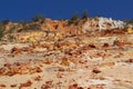 Detail of the colored sand cliffs in Rainbow Beach against deep blue sky, Australia Royalty Free Stock Photo