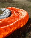 Detail of colorful bright parachute on the ground Royalty Free Stock Photo