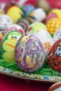 Detail of colorful, painted Easter eggs with different forms and animals Royalty Free Stock Photo