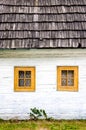 Detail of colorful windows on old traditional house Royalty Free Stock Photo