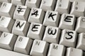 Detail of a computer keyboard with Fake news written on it with Royalty Free Stock Photo