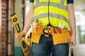 Detail Of Construction Worker On Building Site Wearing Tool Belt Royalty Free Stock Photo
