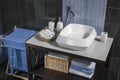 Detail of a contemporary bathroom with sink and accessories Royalty Free Stock Photo