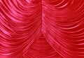 Detail of a contracted red curtain