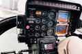 Detail of the controls, indicator clocks and controllers of a helicopter seen from the pilot`s position