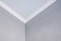 Detail of corner ceiling cornice with intricate crown molding Royalty Free Stock Photo