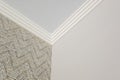 Detail of corner ceiling cornice with intricate crown molding Royalty Free Stock Photo