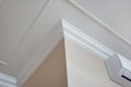 Detail of corner ceiling cornice with intricate crown molding Royalty Free Stock Photo