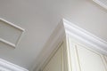 Detail of corner ceiling cornice with intricate crown molding Royalty Free Stock Photo