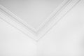 Detail of corner and ceiling cornice with intricate crown molding Royalty Free Stock Photo