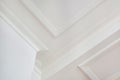 Detail of corner ceiling cornice with intricate crown molding Royalty Free Stock Photo