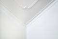 Detail of corner ceiling cornice with intricate crown molding Royalty Free Stock Photo