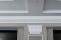 Detail of corner ceiling with intricate crown molding on column