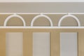 Detail of corner ceiling with intricate crown molding on column with spot light Royalty Free Stock Photo
