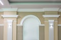 Detail of corner ceiling with intricate crown molding on column with spot light Royalty Free Stock Photo