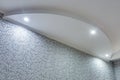 Detail of corner ceiling with intricate crown molding. Suspended ceiling and drywall construction in empty room in apartment or