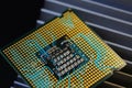 detail of cpu chip processor on aluminum heat sink cooler and electronic circuit effects. Royalty Free Stock Photo