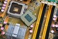 Detail of CPU on a PC Motherboard. High tech technology background Royalty Free Stock Photo