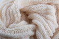 Detail of creamy handmade knitwork