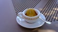 detail of cup of coffee. white cup with saucer, teaspoon. coffee break Royalty Free Stock Photo