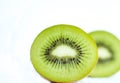 Detail of a cut fresh kiwis on white background