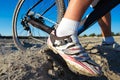 Detail of cyclist man feet riding mountain bike Royalty Free Stock Photo