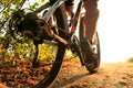 Detail of cyclist man feet riding mountain bike on outdoor Royalty Free Stock Photo