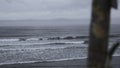 Detail of deck on background of sea on cloudy day. Clip. Blurred rusty part of abandoned boat on background of sea