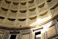 Detail of decorated concrete Dome of the Pantheon, Rome, Italy with beam of sunlight shining through the central opening (oculus) Royalty Free Stock Photo