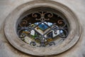 detail of decorative round window in old building Royalty Free Stock Photo