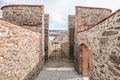 Detail of the defence system with a large watchtower and in the castle wall with embrasures of the fortress Feste Oberhaus near th