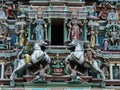 Detail of the dome with many colorful sculptures at the main entrance of Sri Maha Mariamman Temple