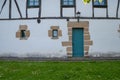 Detail of door and blue windows of the Katxola farmhouse in San Sebastian, Basque Country