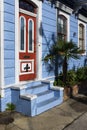 Detail of the door and facade of a colorful house in the Marigny neighbourhood in the city of New Orleans, Louisiana