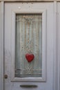 Detail of a door with a heart