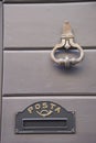 Detail of the door knocker and letter box Royalty Free Stock Photo