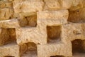 Detail of the dovecote wall at Masada ruins in southern Judean Desert in Israel Royalty Free Stock Photo