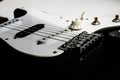 Electronic rock guitar body close up on white backround. Natural light and shadows Royalty Free Stock Photo