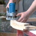 Detail of electric milling cutter in joinery during wood milling Royalty Free Stock Photo